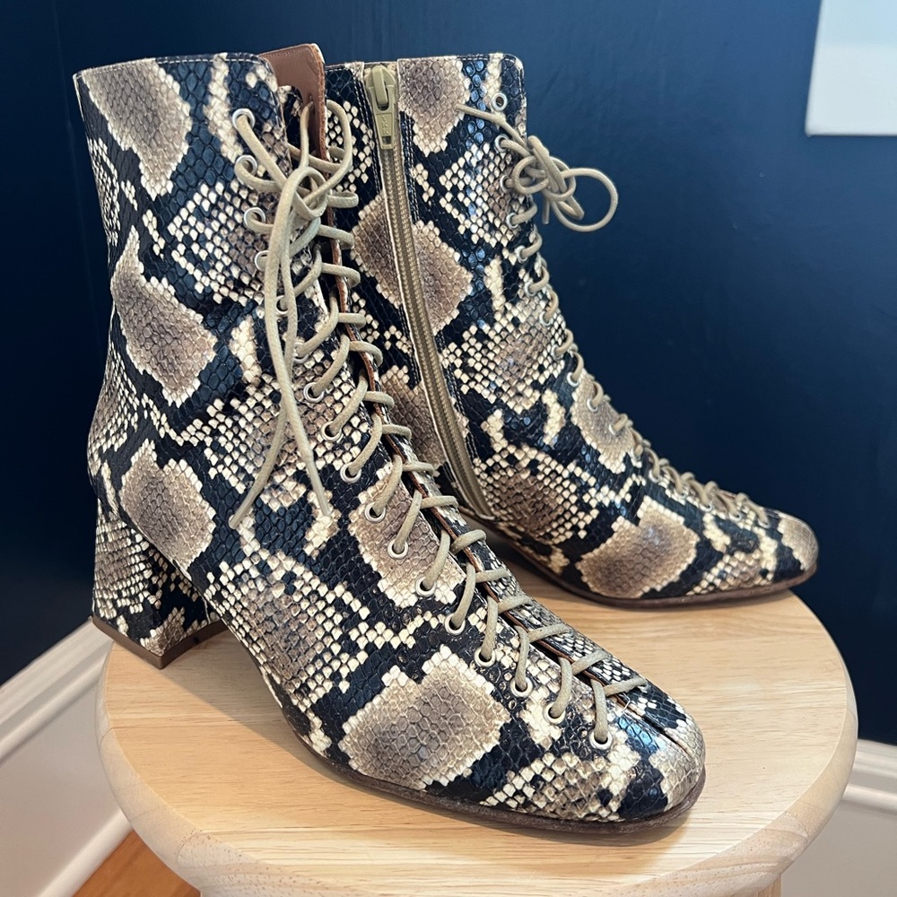 By Far women’s ankle boots in snake print